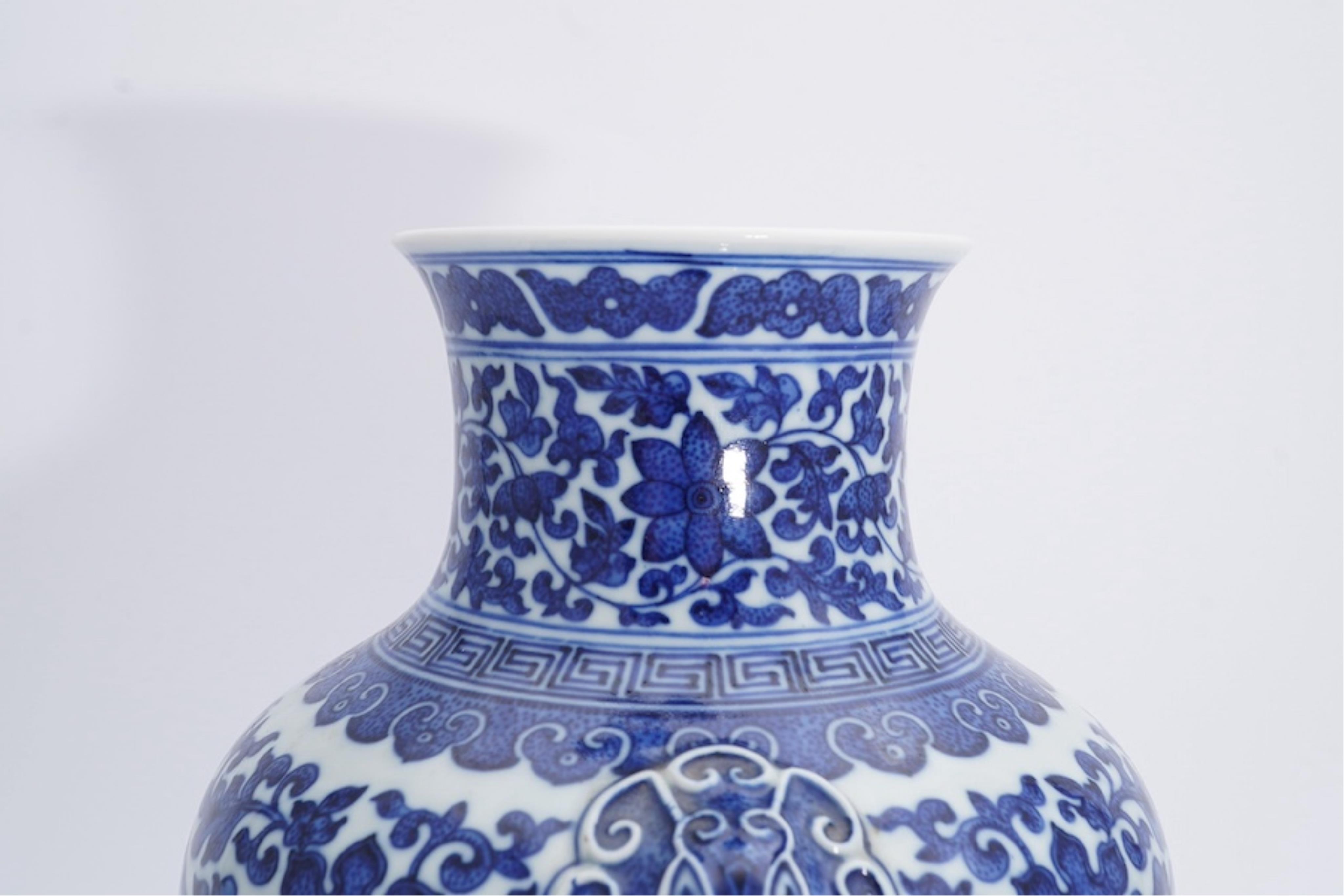 A Chinese blue and white 'peaches' vase, Qianlong mark but later, 27cm high. Condition - good